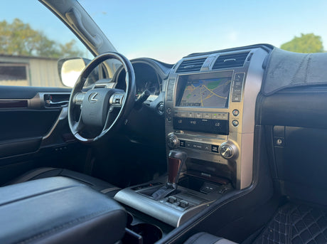 Lexus SUV interior with navigation screen, ideal for road trips or towing alongside your rv rental.