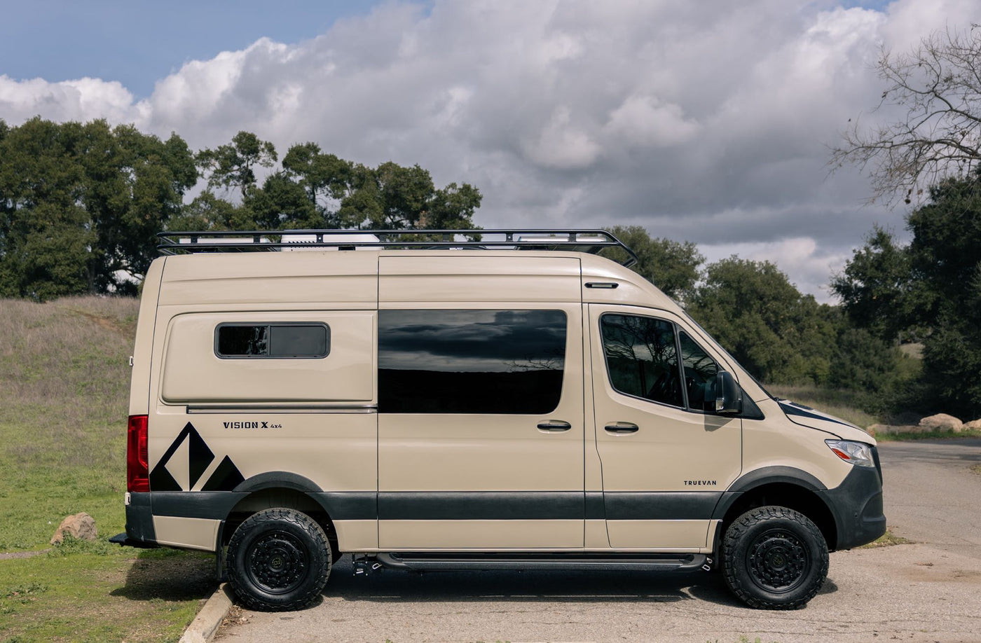  and windows for your road trip.|An RV rental's modern interior kitchen with a sink — photo 6