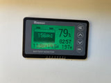 Renogy RV battery monitor shows 79% (156Ah) charge, 13.5V, +14.5A (197W) input. Key for any RV rental.