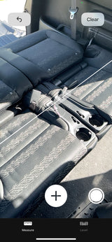  showing potential for comfortable travel.|RV rental interior: rear seats folded for a spacious cargo area