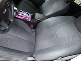 GMC vehicle interior with dark fabric seats, steering wheel, & console. Comfortable, great for an RV rental trip.