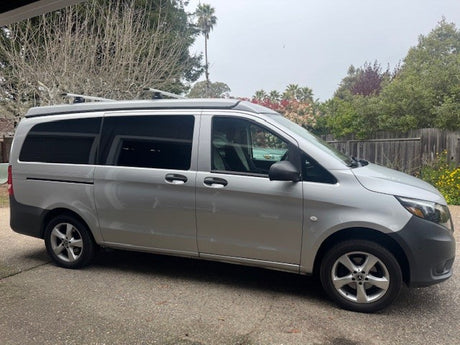 Silver Mercedes-Benz Metris pop-top campervan for rv rental. Perfect for outdoor adventures and travel.