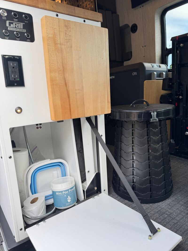  and comfortable black passenger seats.|rv rental van's front cabin: detailed view of dashboard — photo 10