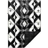 Black & white geometric blanket with plus-sign attachment points. Perfect comfort gear for your RV rental adventures!