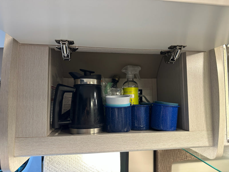  and convenient USB charging ports.|Explore your rv rental's compact wet bath — photo 10