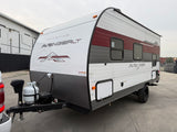 White and maroon Primetime Avenger LT travel trailer, ready for your next rv rental adventure. This compact recreational vehicle is ideal for camping.