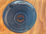 JBL speaker featuring an orange cone behind a mesh grill. Enhance your RV rental experience with quality audio and sound.
