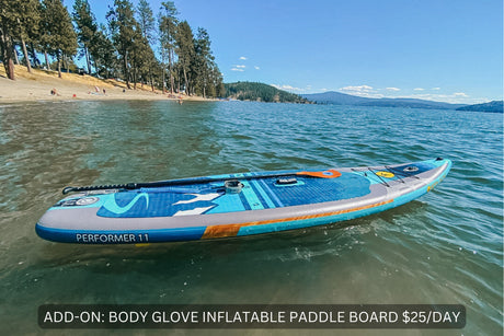 RV rental enhancement: Rent a Body Glove paddle board for lake activities. Beach and forested mountains nearby.