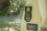 RV rental interior featuring a MaxxAir fan controller and Renogy power unit for climate and energy management.