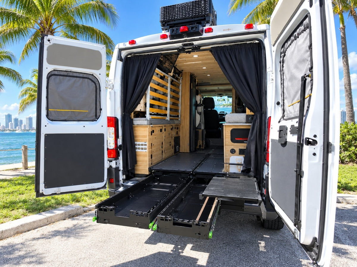  with ocean and beach chairs visible.|Clean RV rental bathroom with a compact toilet — photo 4