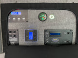RV rental control panel: displays for power (92W/57.1V battery), Dometic climate control, and Storyteller water system.