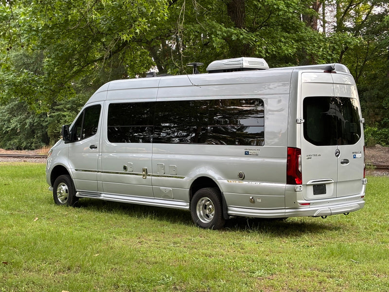  and stylish wood accents.|Spacious RV rental interior: natural wood — photo 5