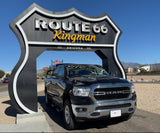 Black Ram pickup under the iconic Route 66 Kingman, Arizona sign. Ideal for your next rv rental road trip!