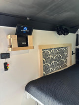 Enjoy your rv rental! This camper features a comfy bed, wall-mounted TV/DVD, Renogy monitor, and dual fans for comfort.