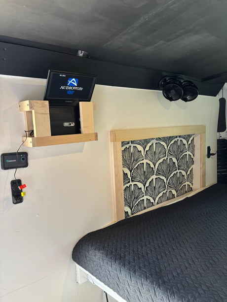 Enjoy your rv rental! This camper features a comfy bed, wall-mounted TV/DVD, Renogy monitor, and dual fans for comfort.