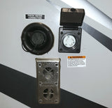 RV rental exterior connections: fresh water, 30-amp electrical power inlet, and a Suburban furnace vent.