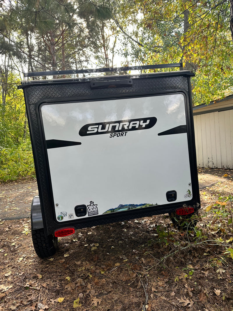 Explore with this Sunray Sport RV rental, a compact travel trailer perfect for camping adventures. — photo 14
