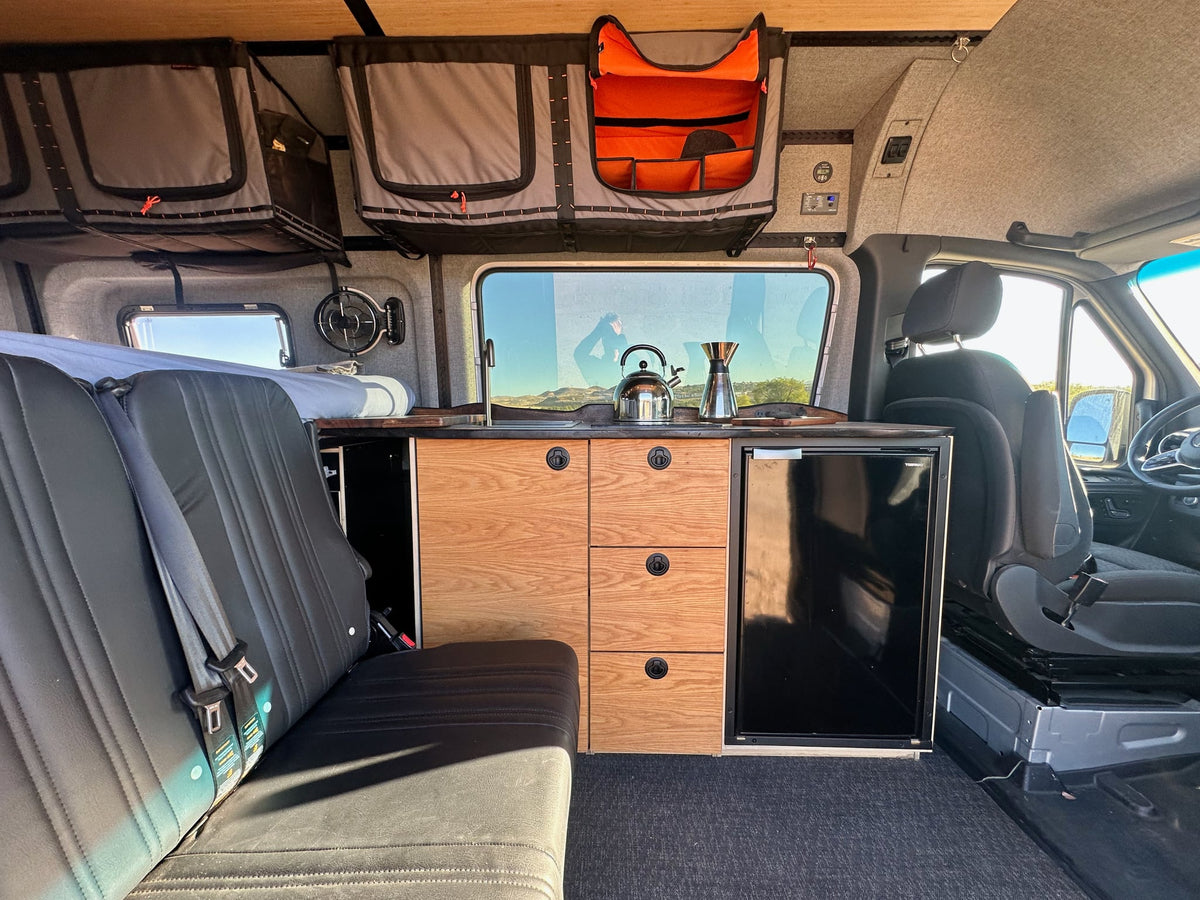  is parked on a dirt path amidst majestic rock formations — photo 3