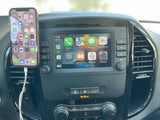 Modern rv rental interior with smartphone and infotainment display for navigation and entertainment on the go.