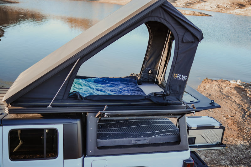 RV rental truck with open rooftop tent & comfy bedding, plus an ARB portable fridge, ready by the lake. — photo 14