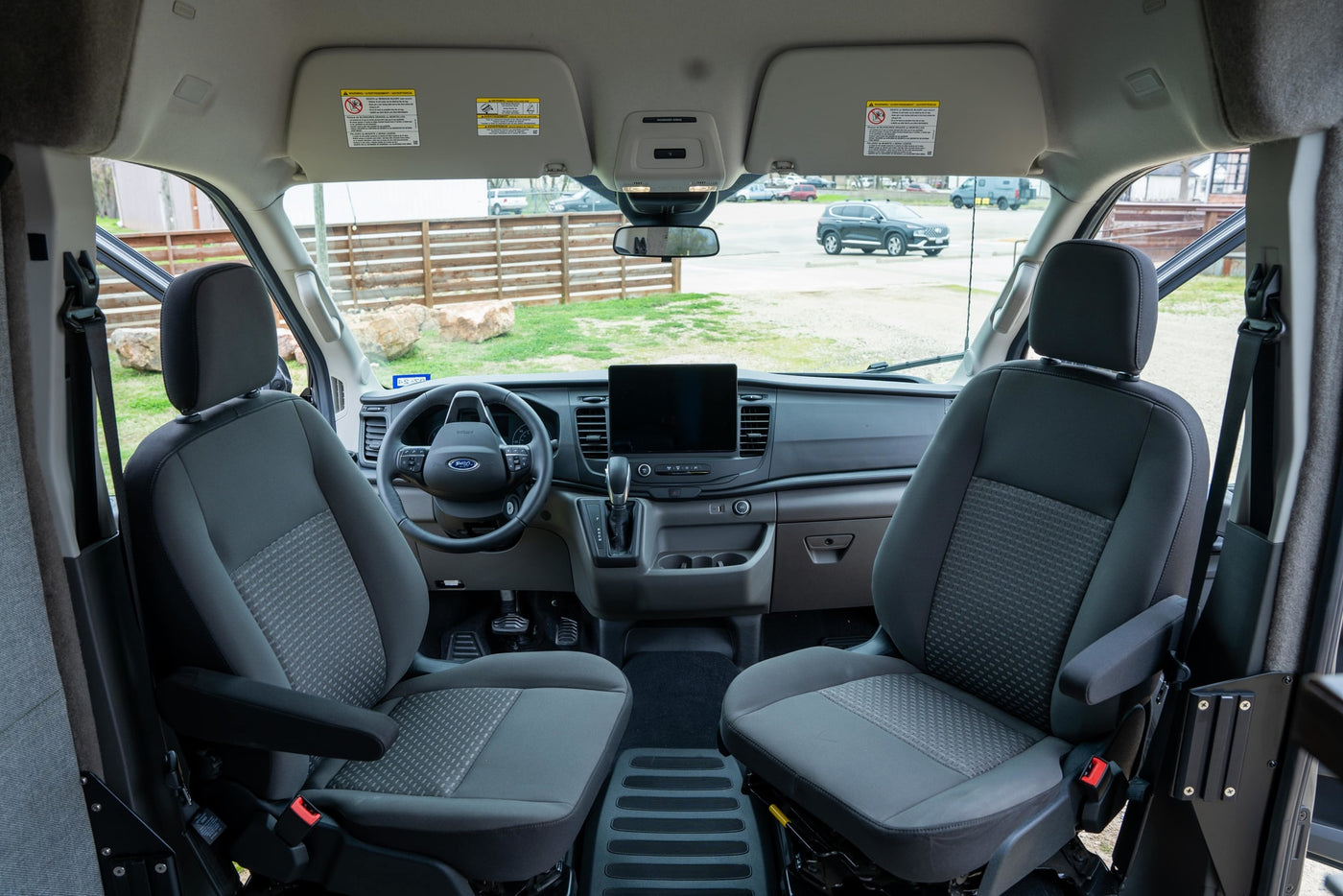  features unique rear storage boxes & an adventure-ready build.|This sleek grey RV rental camper van — photo 15