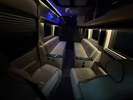 Experience luxury in our RV rental! Spacious interior with comfortable, quilted seating, cup holders, and ambient lighting.