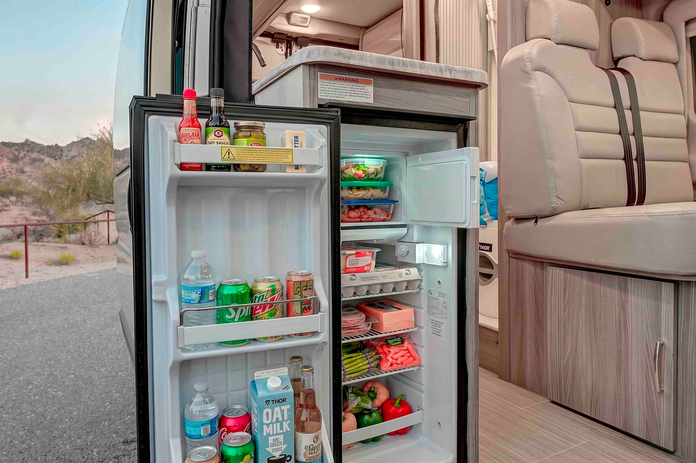  with a ribbed sliding door.|Modern rv rental interior — photo 17