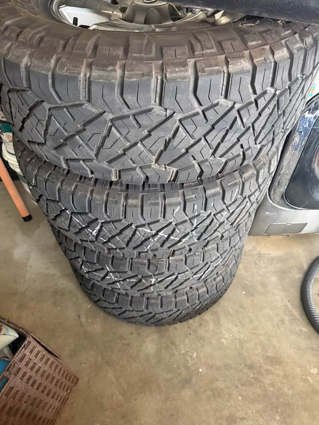 4 Nitto Ridge Grappler Tires 285/70R17 with Toyota Wheels — photo 3