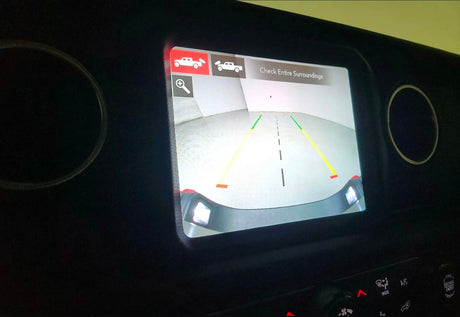 Essential for an rv rental: this vehicle's rearview camera shows parking lines & camera modes on its infotainment screen.