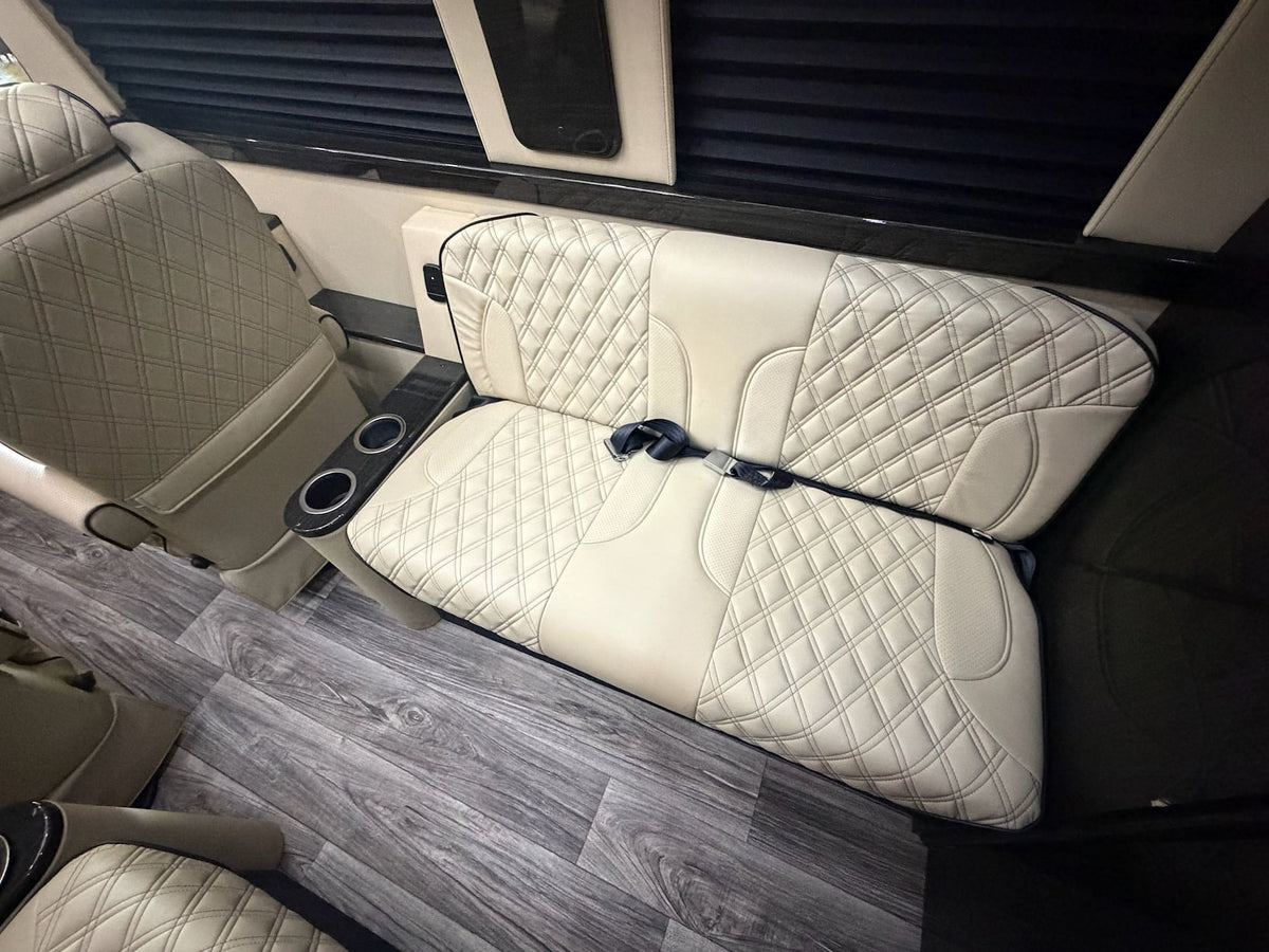  perfect for an rv rental adventure. Parked outside on a sunny day.|Sleek black Mercedes-Benz Sprinter conversion van — photo 12