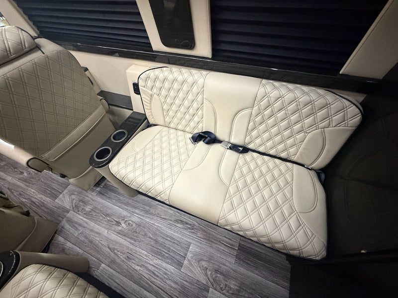  perfect for an rv rental adventure. Parked outside on a sunny day.|Sleek black Mercedes-Benz Sprinter conversion van — photo 12