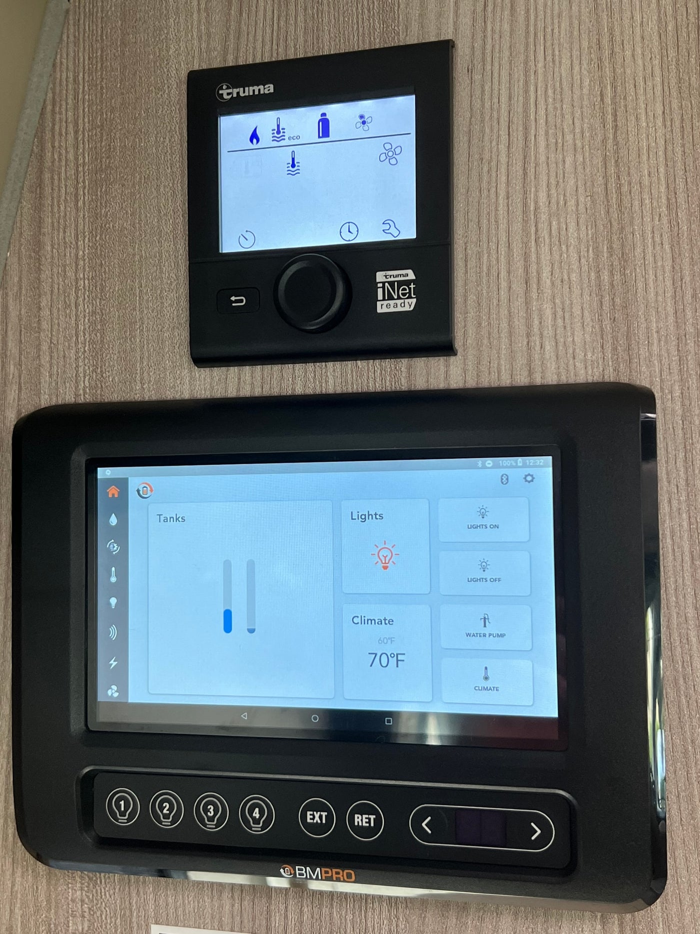 RV rental internal controls: Truma climate system and BMPRO digital panel for tank levels, lights, and climate settings. — photo 17