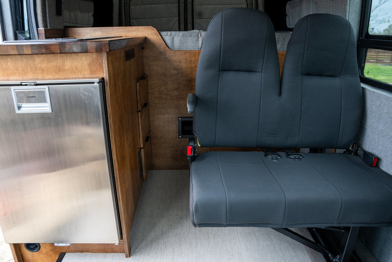  is an ideal RV rental option.|Grey custom camper van — photo 13