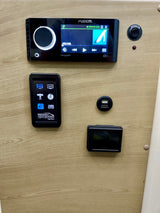 RV rental tech: Fusion media system with Bluetooth & Wi-Fi, intercom, USB, and custom controls for zones and media inputs.