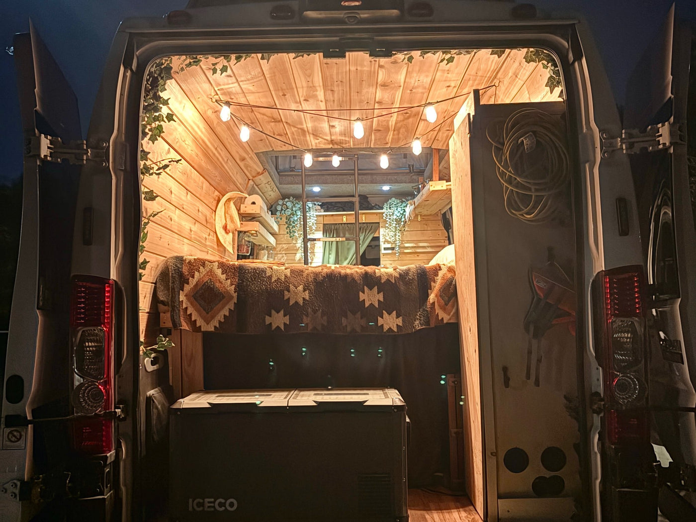 and a plaid pillow. Sunlight streams in.||||A Bluetti Elite 300 portable power station — photo 13
