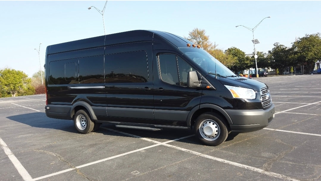 Discover this spacious black Ford Transit high-roof van, a perfect choice for your next RV rental.