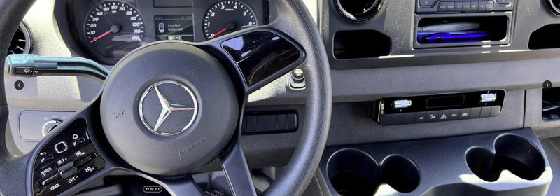 RV rental van interior: Mercedes-Benz steering wheel, dashboard, climate controls, and cupholders. "Key Not Detected" warning displayed. — photo 7