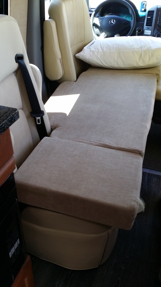  ready for adventure.|A silver Mercedes-Benz Sprinter van