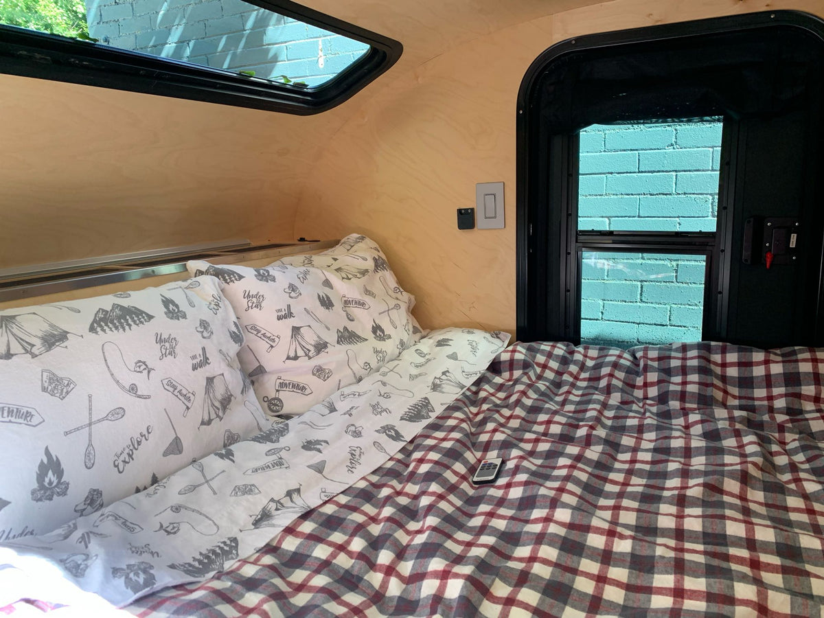  and bright windows.|Cozy RV rental: light wood cabinets — photo 3