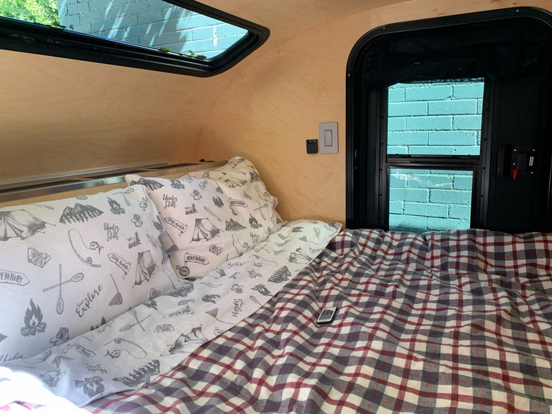  and bright windows.|Cozy RV rental: light wood cabinets — photo 3