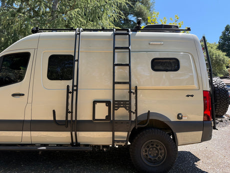 This adventure-ready 4x4 camper van, ideal for rv rental, features a roof rack, ladder, and off-road tires for exploring.