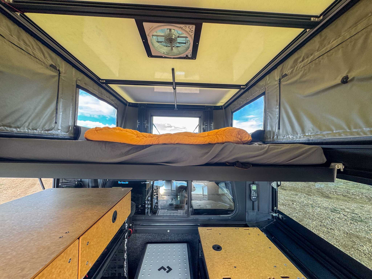  and modular storage system. Ready for your journey.|Adventure-ready rv rental interior: shelf with drawers