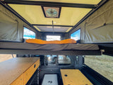  and modular storage system. Ready for your journey.|Adventure-ready rv rental interior: shelf with drawers