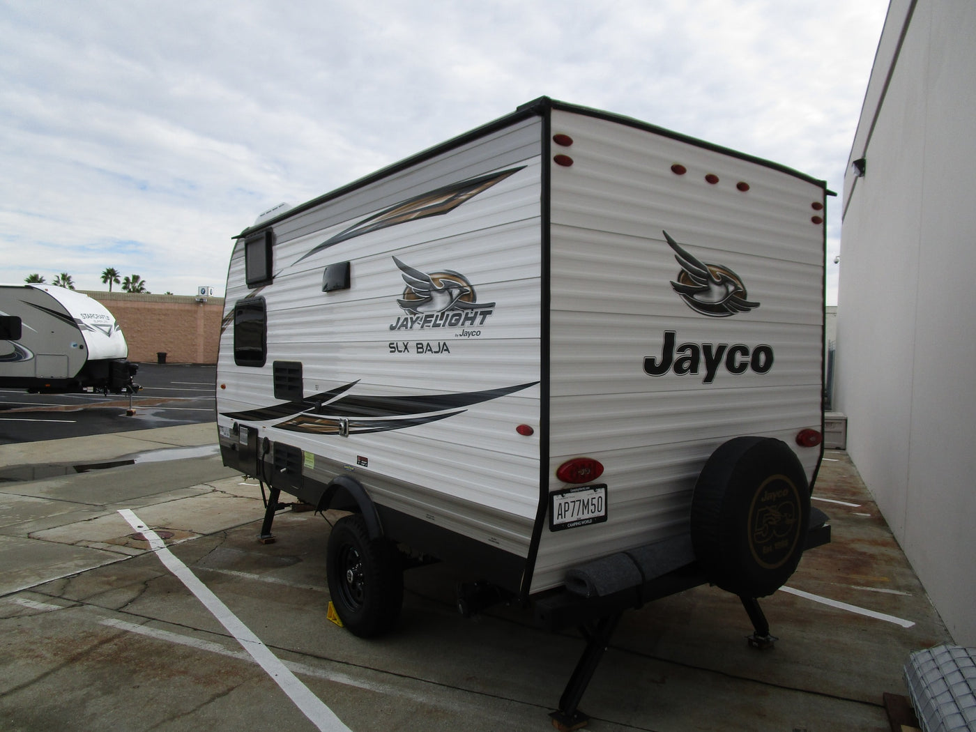  perfect for an rv rental or camping.|A white Jayco travel trailer — photo 3