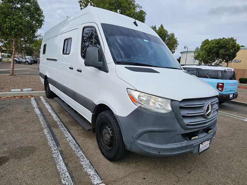 White Mercedes Sprinter van — photo 1