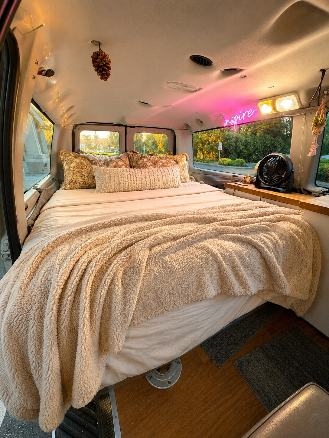  and seating.|Cozy rv rental interior featuring a dining area — photo 2