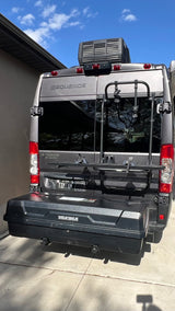 Grey Sequence RV rental with a Thule bike rack and Yakima cargo box, ready for adventure.