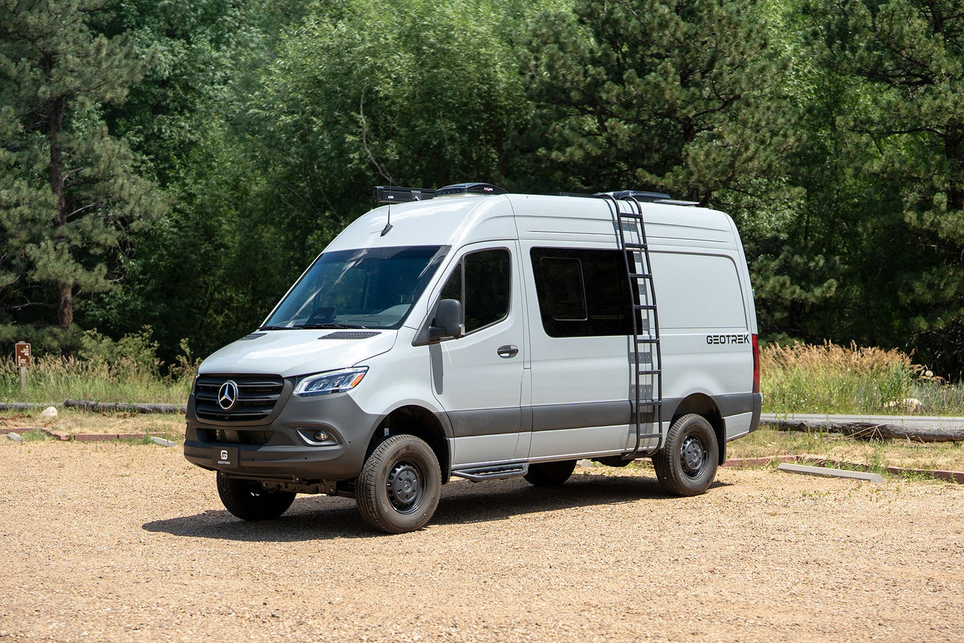 Customized light grey Mercedes Sprinter adventure van with roof ladder, ideal for RV rental exploring. — photo 2