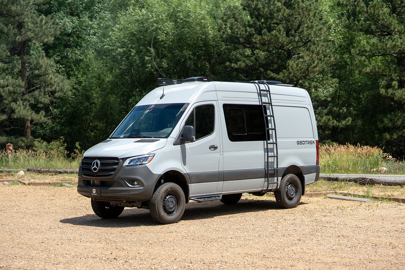 Customized light grey Mercedes Sprinter adventure van with roof ladder, ideal for RV rental exploring. — photo 2
