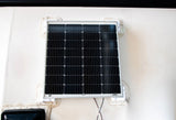 Solar panel mounted on an RV roof with sealed brackets, providing off-grid power for your rv rental adventures.